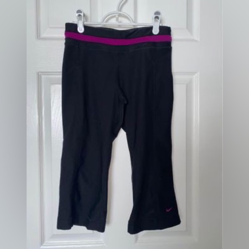 Black and purple Nike crops